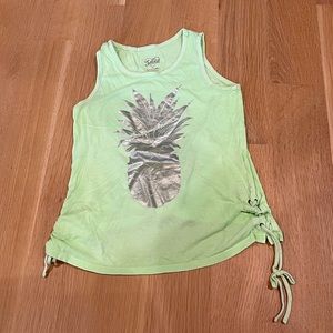 Green tank top with string design on sides.